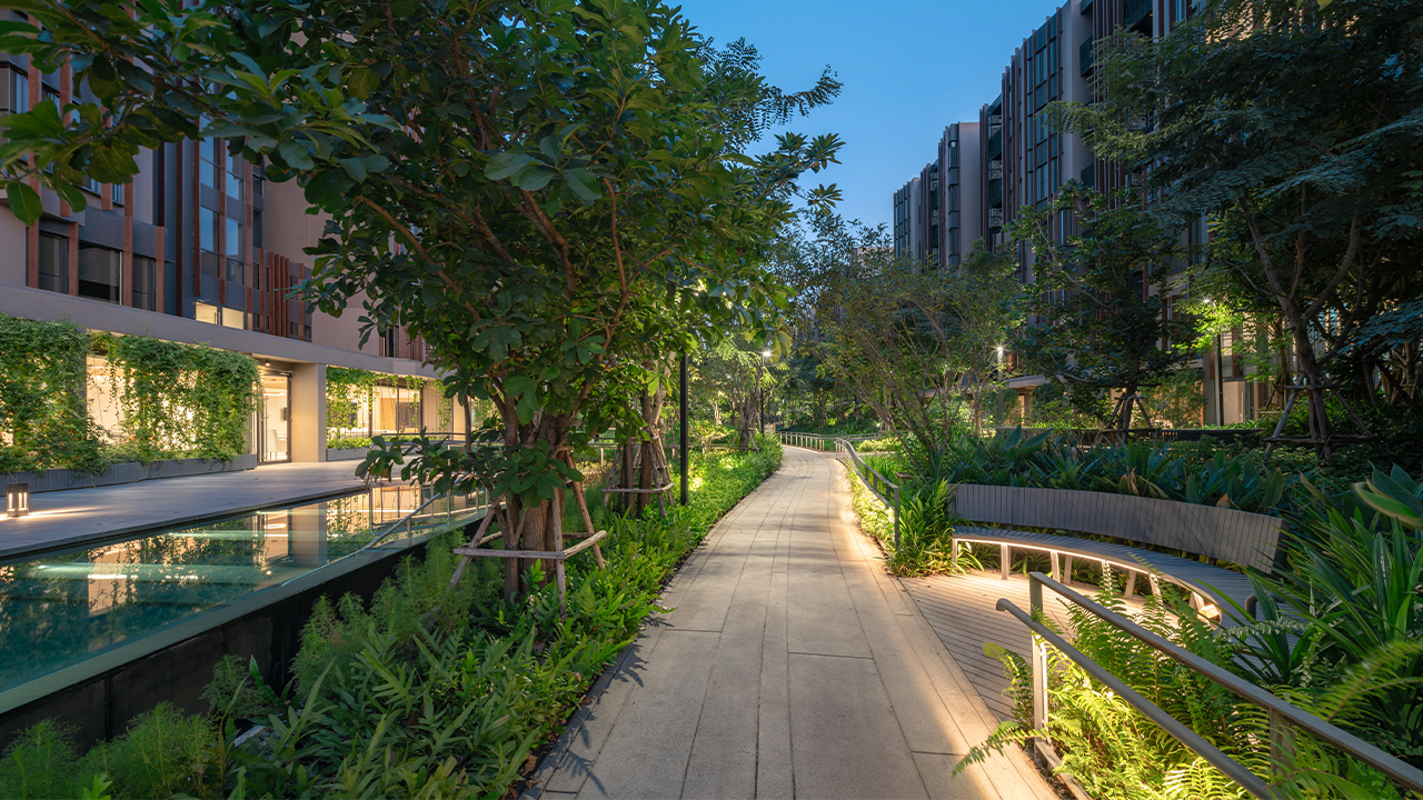 Real accessible walking path beside the hospital-integrated rehabilitation campus near Khlong Luang